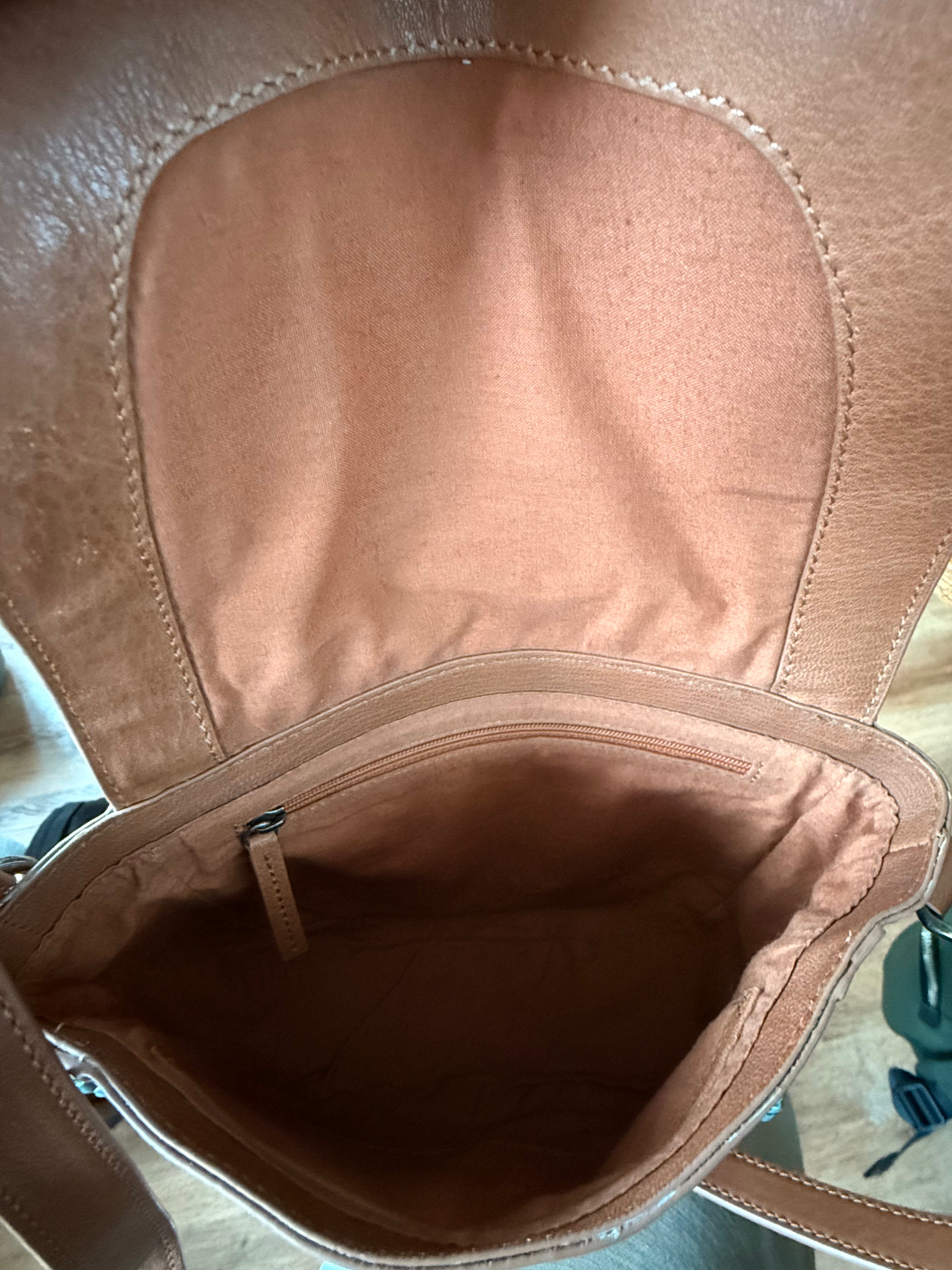 SS91 washed leather crossbody with whipstitch and knotting details