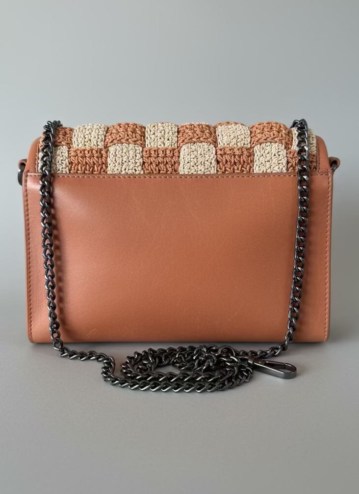 SS90 leather crossbody with intricate checkerboard weave flap
