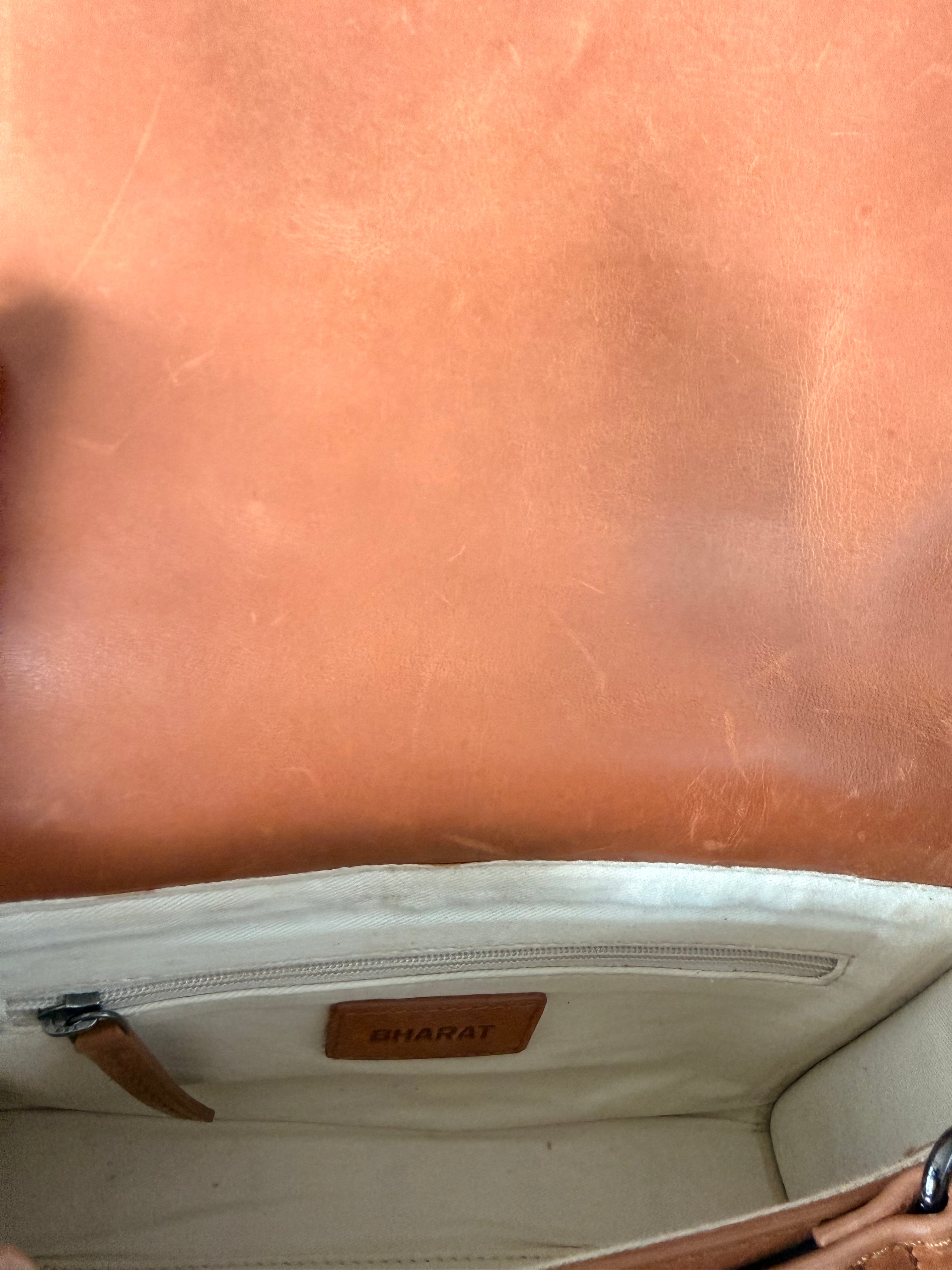 SS90 leather crossbody with intricate checkerboard weave flap